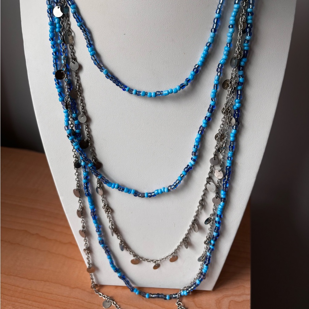 Blue seed bead necklace/ layered look/ silver tone disks/ measures 20-36…